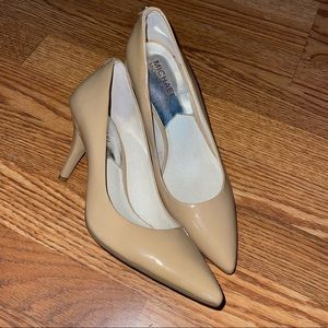 Michael Kors nude pointed toe heel.